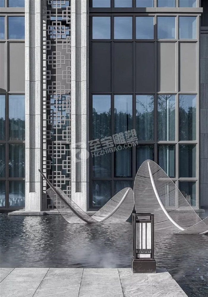 地產鏤空創(chuàng)意羽毛不銹鋼雕塑定制