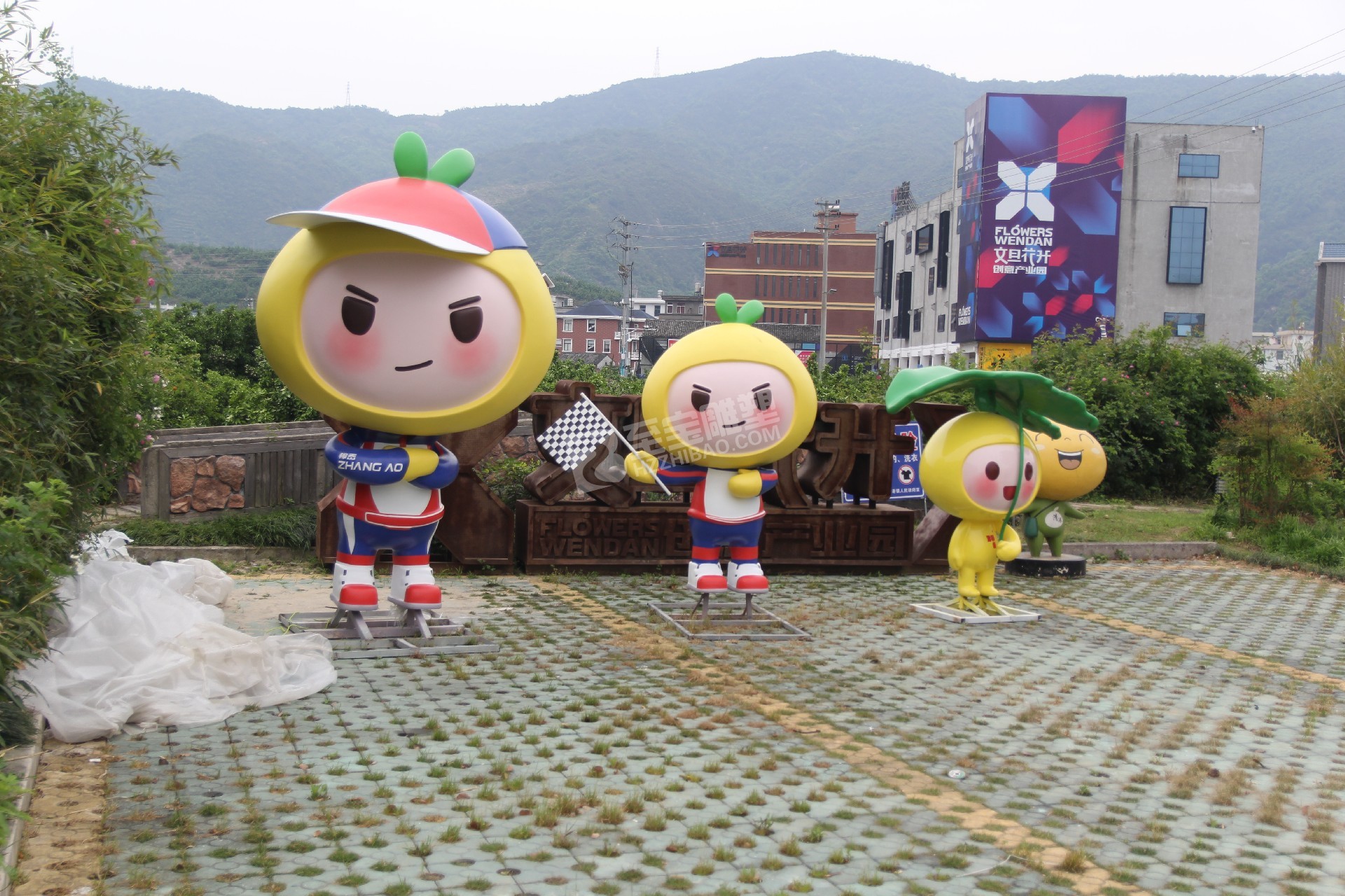 臺州文旦觀光風(fēng)情帶建設(shè)玻璃鋼IP娃娃雕塑項目